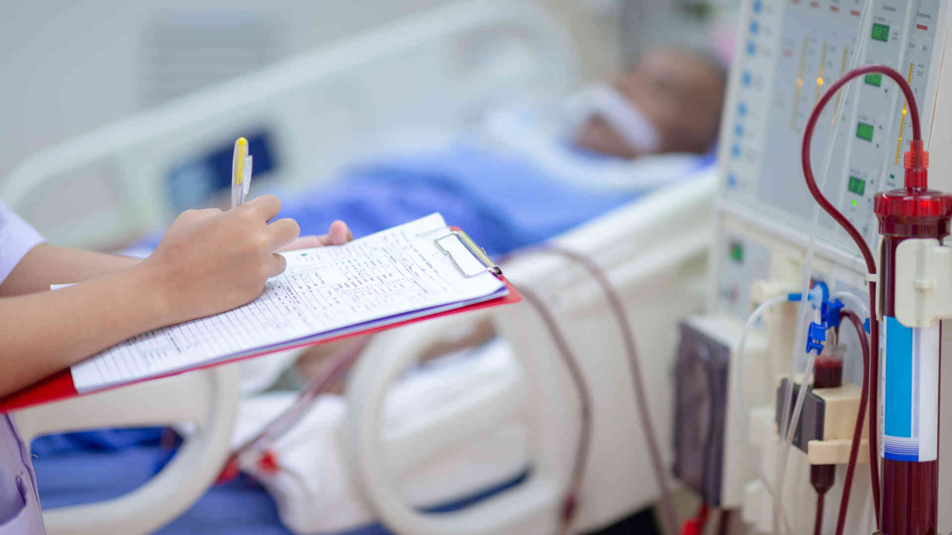 CRRT machine being managed by a nurse